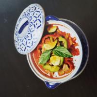 EN1. Red Curry · Red curry, coconut milk, carrot, bell pepper, bamboo shoot, zucchini, green bean, and basil.