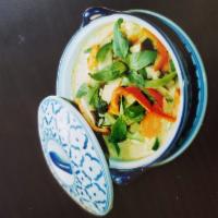 EN2. Green Curry · Green curry, coconut milk, carrot, bell pepper, bamboo shoot, zucchini, green bean, and basil.