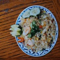 R2. Thai Fried Rice · Fried rice with egg, carrot, onion, pea, cucumber, and cilantro.