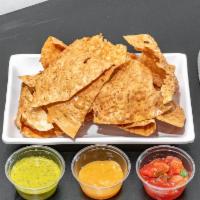 Gluten Free Papadum Chips and Chutneys · Light gluten free lentil chips fried fresh and served with our chutney trio. Vegan. 