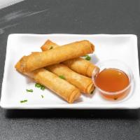 Spring Rolls · 4 rolls. Crispy wrapper filled with noodles and cabbage blend and aromatic vegetables. Serve...