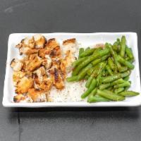 Filipino Chicken Bowl · Savory soy-vinegar seasoned chicken with jasmine rice with a side of garlic green beans. Top...