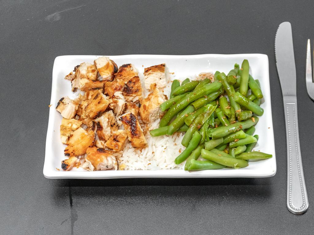 Filipino Chicken Bowl · Savory soy-vinegar seasoned chicken with jasmine rice with a side of garlic green beans. Topped with fried garlic and extra adobo sauce.