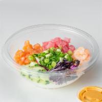The Friday Bowl · Salmon, tuna, shrimp, sweet onion, cucumber, red cabbage, cilantro, green onion, sriracha ai...