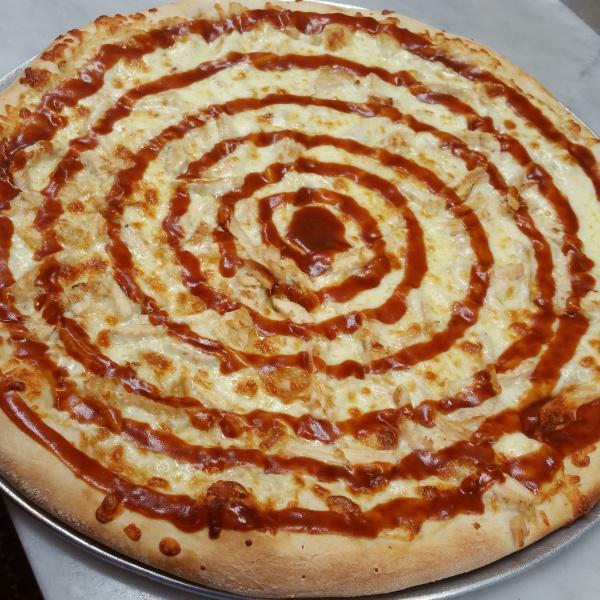 Texas BBQ Pizza · Cheese, grilled chicken and BBQ sauce.
