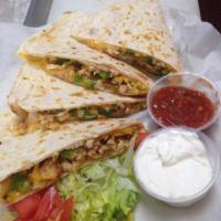 Grilled Chicken Quesadilla · Your choice of tortilla. Stuffed with green peppers, onions, grilled chicken, and cheese. Se...