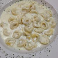 Tortellini Alfredo · Parmesan and garlic cream sauce. Served with garlic knots.