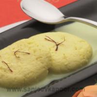 Ras Malai · Sweet cottage cheese dumpling flavored with saffron and cardamom. 