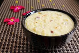 Rice Kheer · Basmati rice cooked with milk and caramelized pistachios.