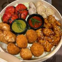 Assorted Momos (Veg & Paneer Only) - 20 pcs · 20 pcs of Momos are bite-size dumplings with paneer and veg filling, wrapped in a dough acco...