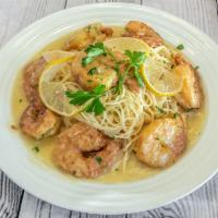 Shrimp Francese · Shrimp dipped in egg, sauteed in butter, lemon and wine sauce.