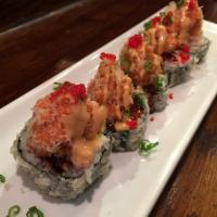 Dynamite Roll · Fried roll with tuna, salmon, white fish, kani and avocado topped with spicy tuna. Served wi...