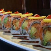 Hangry Roll · Spicy tuna, avocado, cucumber, top with seared salmon and lemon.