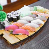 Sushi Deluxe · 12 pieces of sushi with tuna roll or spicy tuna roil.