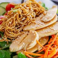 Asian Chicken Salad · Mixed greens, carved chicken breast, Chinese sesame noodles, cucumbers, carrots and house ma...
