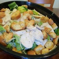 Chicken Caesar Salad · Romaine, carved chicken breast, Parmesan, toasted croutons and house made Caesar dressing.