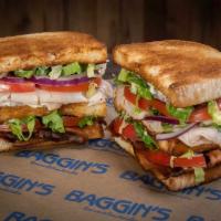 Club Sandwich · Roasted turkey breast, crisp bacon, lettuce, red onions, tomatoes and mayo on toasted Italia...