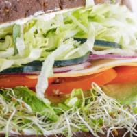 Veggie Sandwich without Cheese · Mayo, sprouts, lettuce, tomatoes, cucumber slices, avocado and onions on 12 grain bread.