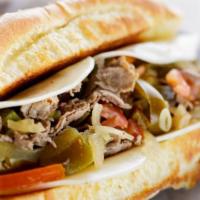 Beef Cheesesteak Sandwich · Sliced rib eye steak, provolone cheese, tomatoes, grilled onions, dill pickles, and mild swe...