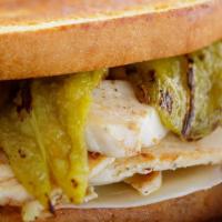 Anasazi Sandwich · Carved chicken breast seasoned with lemon, provolone cheese and green chili on grilled sourd...