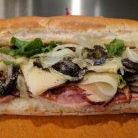 The Afternoon Sandwich · Oven roasted ham and turkey, provolone, lettuce, Parmesan and olive on a grilled 8