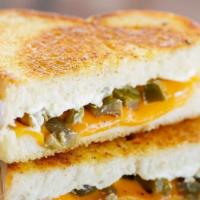 Jalapeno Popper Grilled Cheese Sandwich · Perfectly melted cheddar cheese and cream cheese and chopped jalapenos on Italian white.