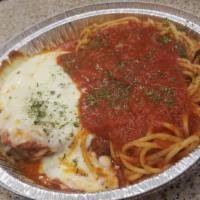 Eggplant Parmigiana · Breaded and fried eggplant slices served in our homemade marinara with your choice of pasta,...