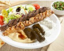 FAMILY Plate · Great value with over $90 worth of food. Fresh Greek salad, cucumber sauce, stuffed grape leaves, hummus, basmati rice, hand-cut fries, Greek vinaigrette dressing, 6 kabobs and 6 grilled Grecian pitas. Serves 6 people.