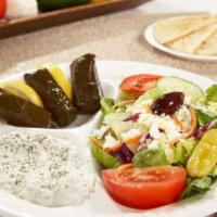 Greek Veggie Platter · Fresh Greek salad, stuffed grape leaves, cucumber sauce and grilled Grecian pita.