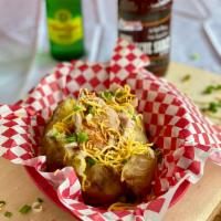 #2. Super-Stuffed Potato · Fixins' topped with choice of chopped beef, chicken, turkey or pulled pork.