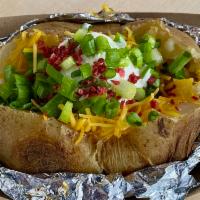 #1. Just The Stuffed Potato (no Meat) · No meat. Include all the fixins' - butter, sour cream, cheddar cheese, chives and bacon.