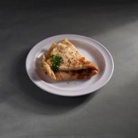 Pizza Style Crepe · Homemade margherita pizza sauce and mozzarella cheese.