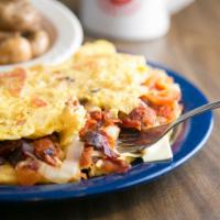 Persy's Omelet · American cheese, tomato, onion and bacon.