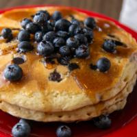 Blueberry Pancakes · Loaded blueberry buttermilk pancakes.