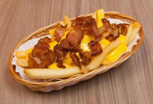 Bacon Fries · French fries with nacho cheese and chopped bacon.