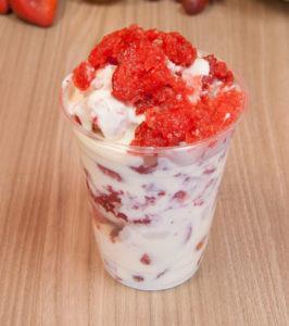 Frozen Fresas con Crema · Frozen strawberries with sweet cream, pecan, and granola.