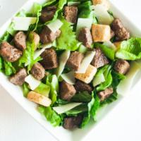 Steak Tip Salad · Marinated  top grade sirloin steak tips,  grilled mushrooms, peppers and red onions served o...