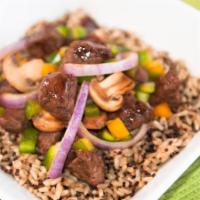 Steak Tip Rice Bowl · Top grade sirloin tips served with grilled peppers, mushrooms and red onions.