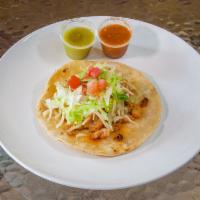 Chicken Taco · Pollo. Includes soft shell corn tortilla, lettuce, tomato, cheese, sour cream and hot sauce ...