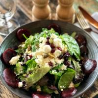 The Boutique Salad · Fresh mixed greens, red beets, pistachios, cranberries and goat cheese