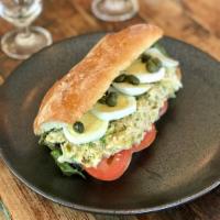 Tuna Salad Sandwich on Ciabatta · Our homemade tuna fish salads with mayonnaise and fresh herbs served with hard boiled egg, c...