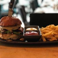 The Boutique Burger · Our classic beef and lamb burger plus sauteed mushrooms, red beets, bacon, double mozzarella...