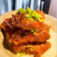 (12) Alhambra Buffalo Wings (12) for $26 · Our house-made cayenne buffalo sauce served with creamy blue cheese