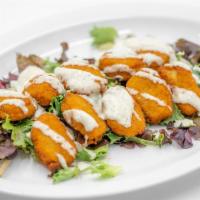 Happy Nuggets (NF) · Crispy nuggets on top of spring mix. Served with ketchup, ranch, bbq sauce, buffalo sauce, o...