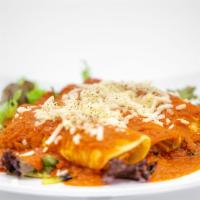 Enchiladas with Mozzarella (GF/NF) · Three corn tortillas filled with jackfruit carnitas, topped with house enchilada sauce and m...