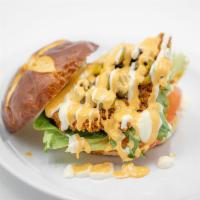 Jalapeno Chicken · Breaded soy chick'n, nacho jalapenos, lettuce, tomato, mayo and spicy jalapeno sauce on a to...