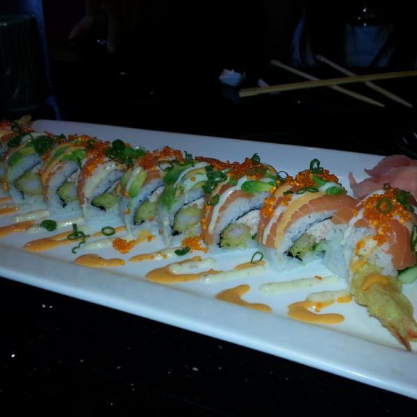 Forever 21 Roll · Snow crab, tempura shrimp, cucumber topped with salmon, sake, avocado, masago, onion spicy sauce and white sauce.