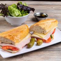 Ham and Cheese Sandwich · Served on French baguette. Ham, Swiss cheese, lettuce, tomatoes and mustard butter.
