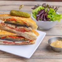 Grilled Veggie Sandwich · Served on focaccia. Zucchini, eggplant, portobello mushrooms, tomatoes, red bell peppers and...