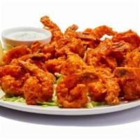 Buffalo Shrimp · Hand-breaded shrimp tossed in your favorite wing sauce. Tender inside, crispy outside. Just ...